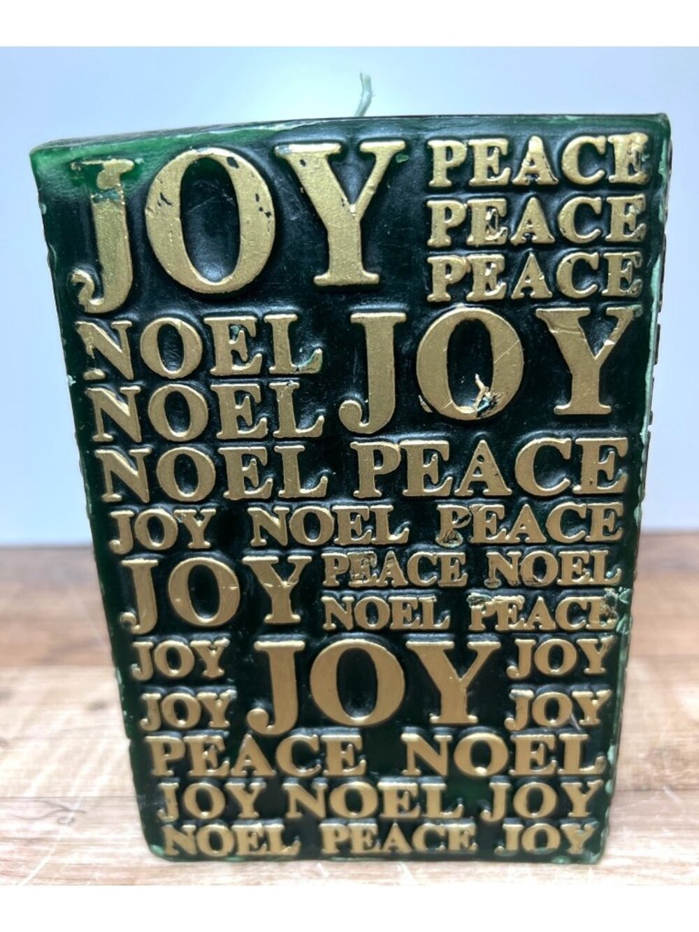 Green & Gold Decorative Holiday Candle With Embossed Text "Joy Peace Noel"